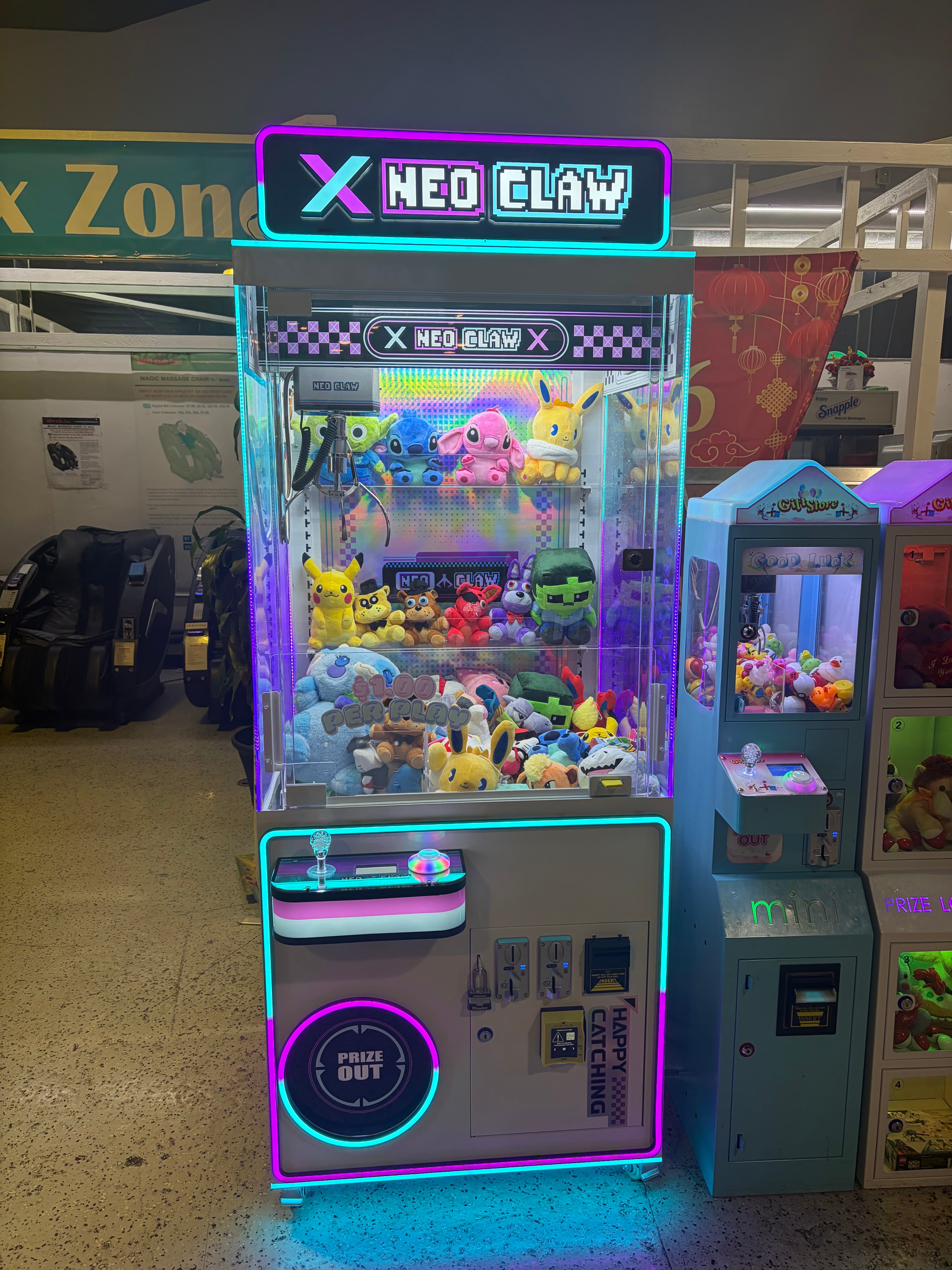 Vibrant Neo Claw arcade machine with neon lights, filled with colorful plush toys and characters.