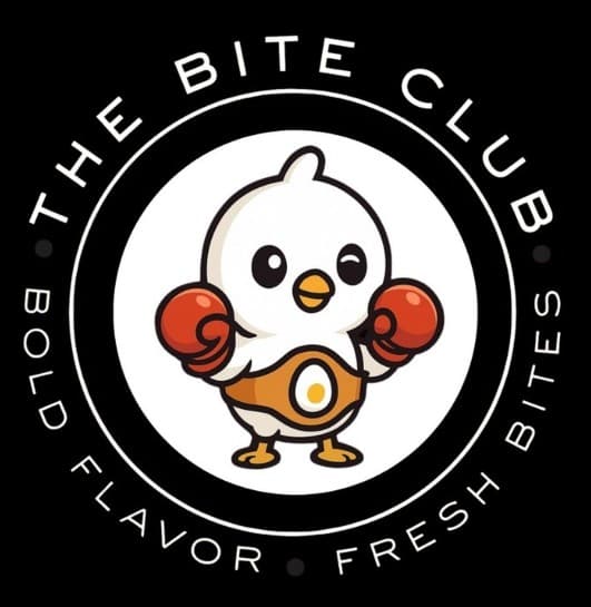 Cartoon chick wearing red boxing gloves and championship belt inside The Bite Club circular logo.